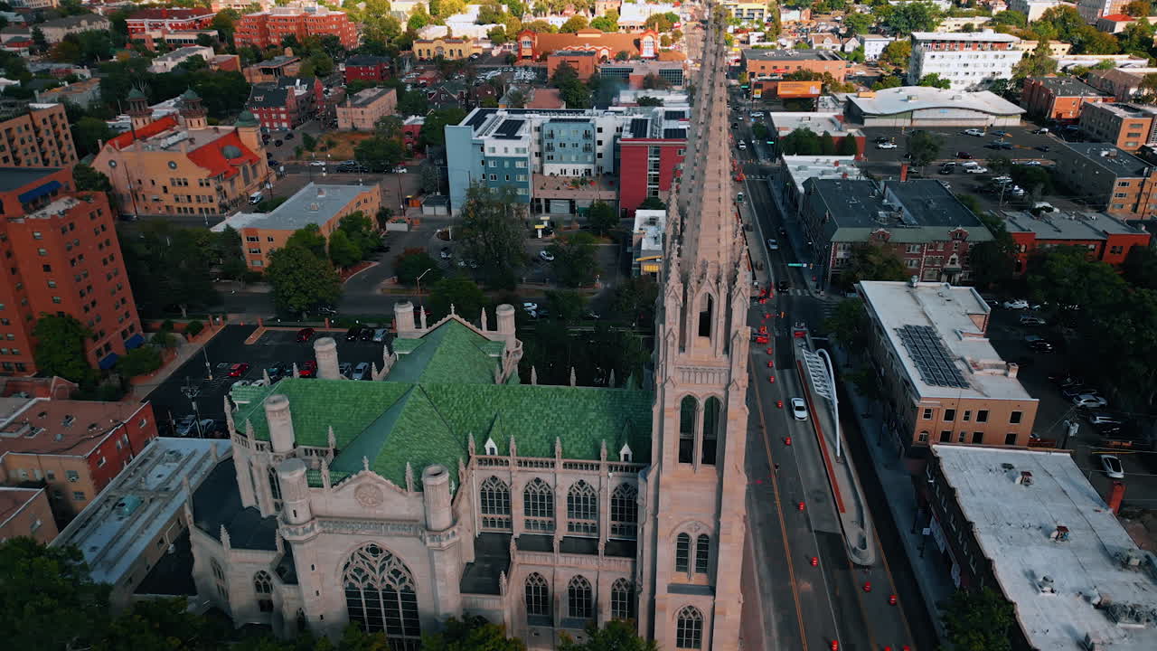 Denver, USA, 24 August 2025: Rising over the towers of the stunning Cathedral Basilica of the Immaculate Conception. Beautiful cityscape of Denver, Colorado, USA from drone