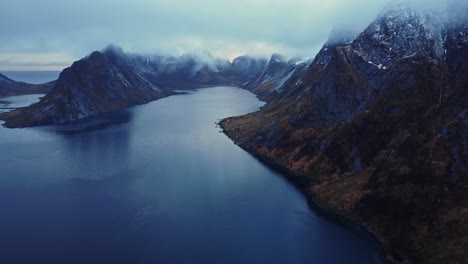 picturesque drone view of scenic fjord under gloomy sky