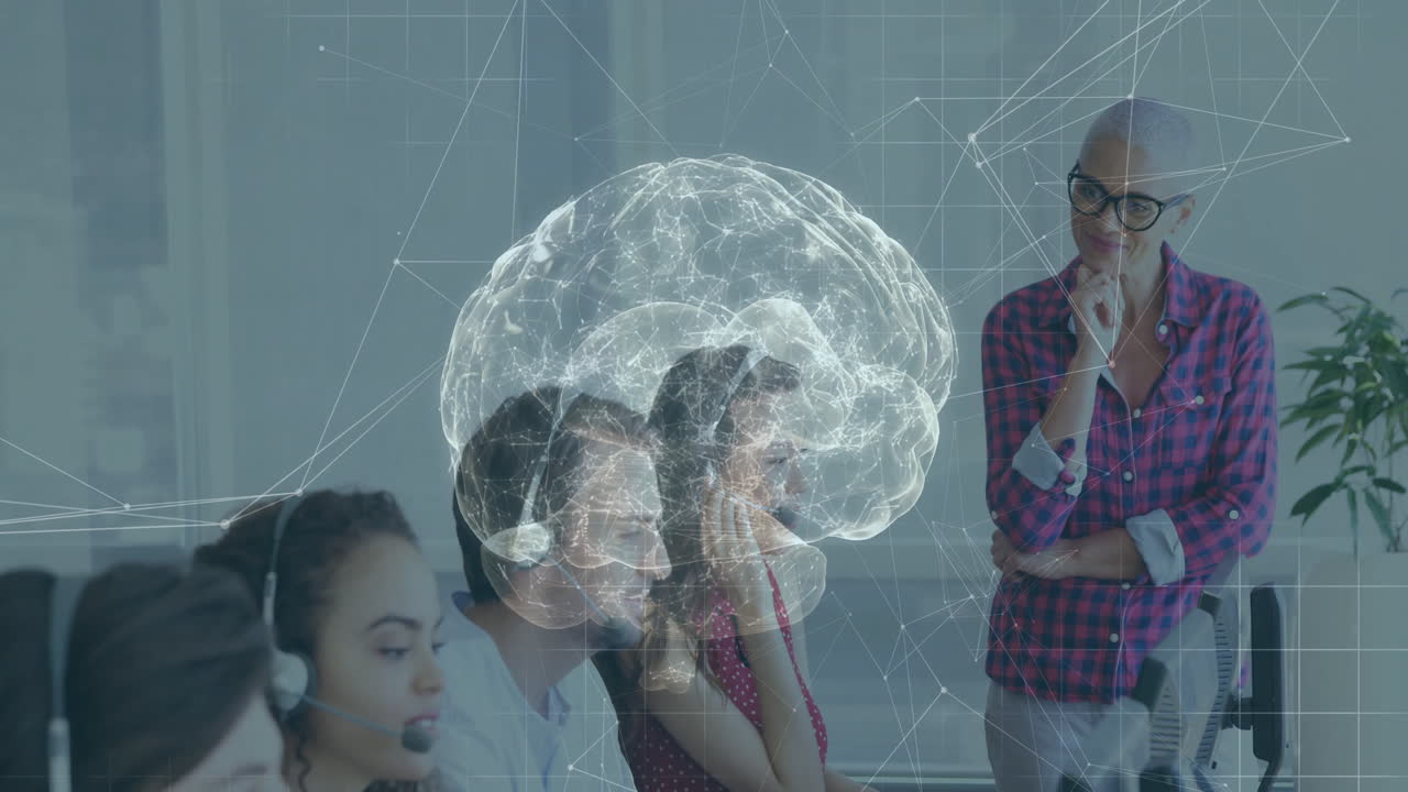 Diverse team working at computers with brain and network animation overlay