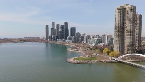 condominium buildings on the skyline of parklawn, neighbourhood in toronto. aerial flyover.