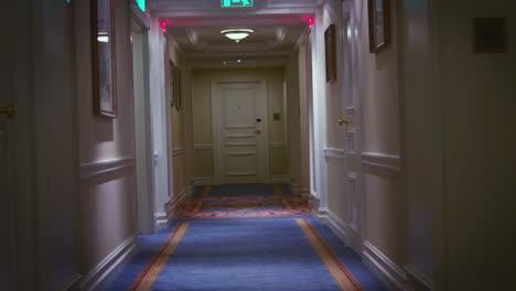 Point-of-view-walking-on-long-corridor-in-luxury-hotel-or-luxury-mansion