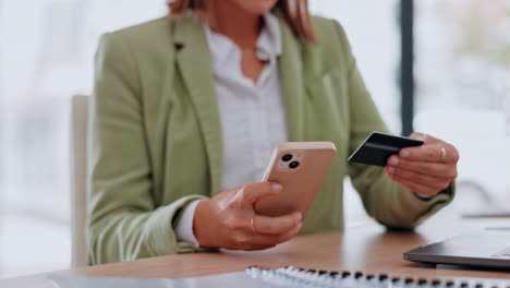 Credit-card,-phone-and-woman-hands-in-office