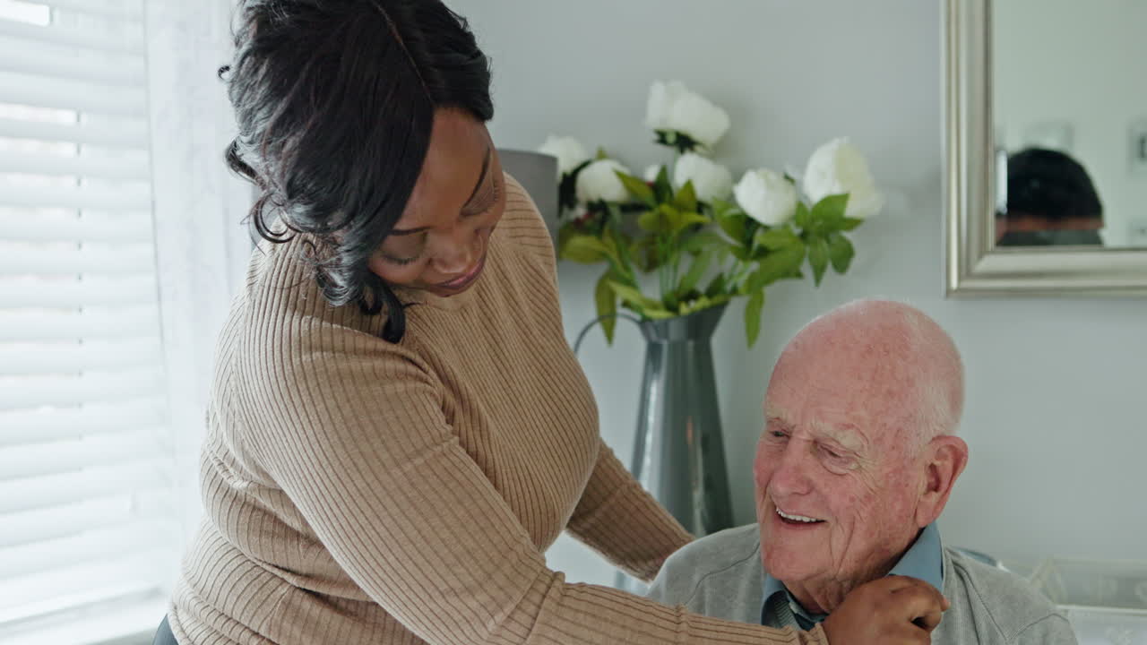 Elderly man receiving care from caregiver