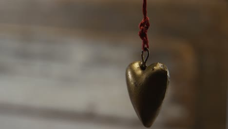 heart shaped decoration hanging in mid air 4k