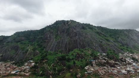 shot of a mountain with building around it