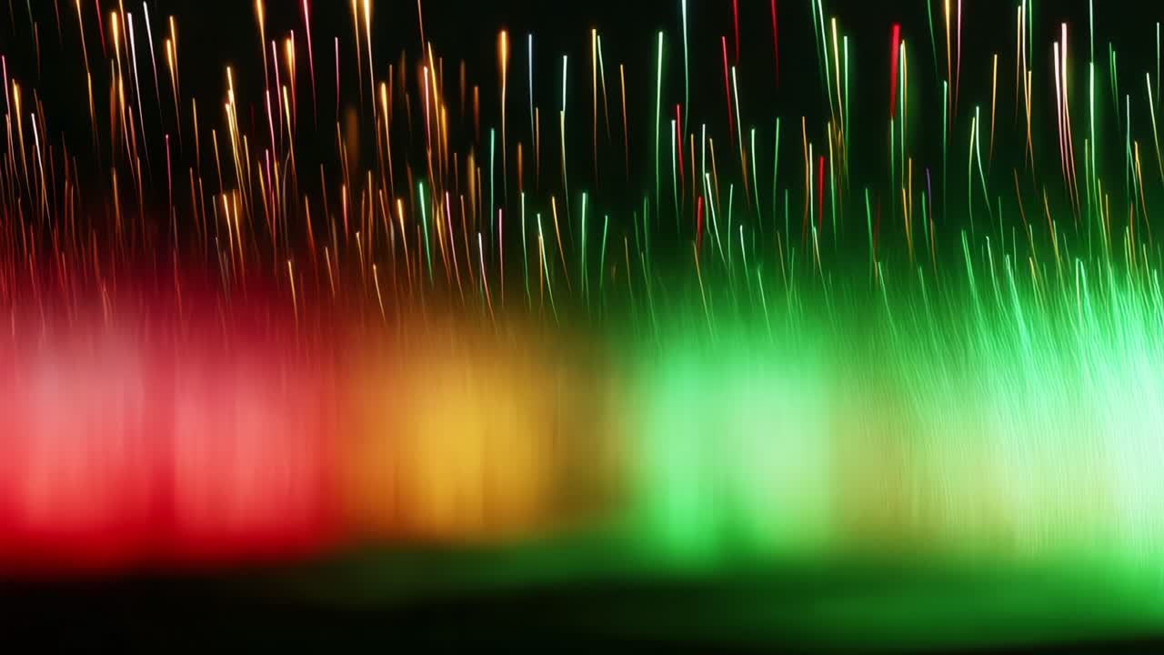 A Mesmerizing Display of Colorful Light Streaks Against a Dark Background, Showcasing an Artistic Representation of Motion and Vivid Colors that Captivate the Viewer with Their Dynamic Patterns and Energetic Vibe