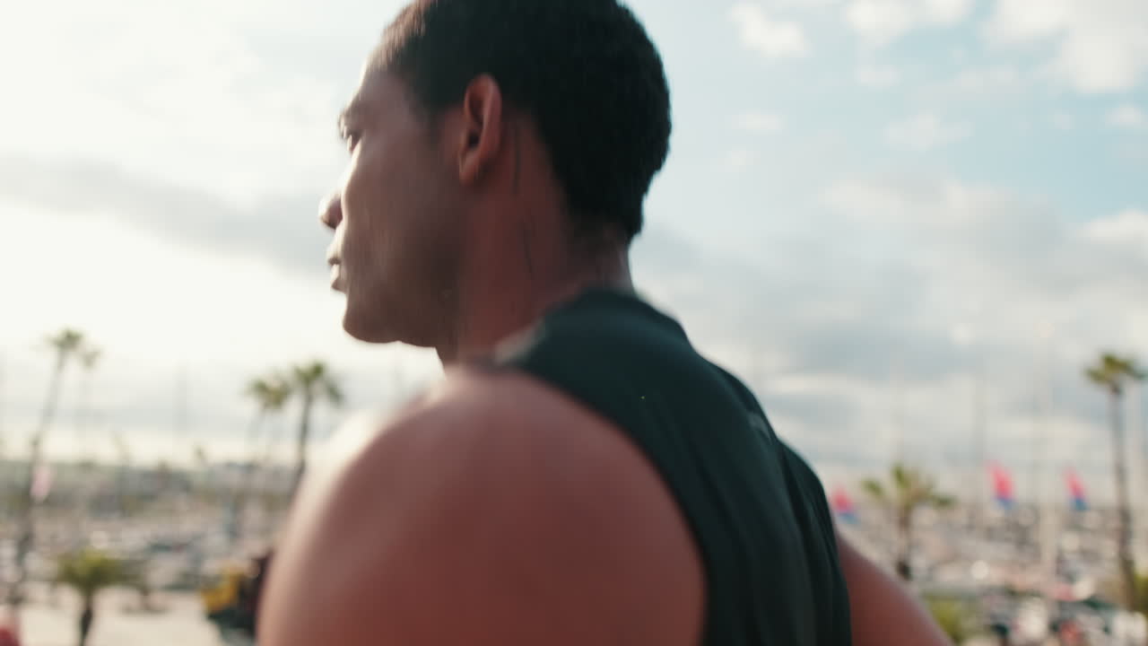 Man Running Outdoors By the Sea