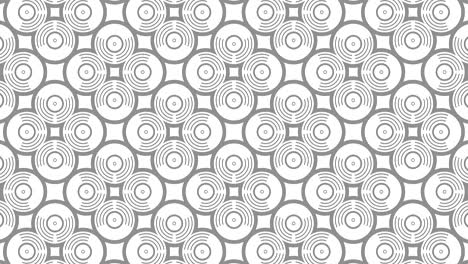 patrón gráfico en blanco y negro con efecto estroboscópico e hipnótico, mientras aumenta en tamaño y luego lo reduce.