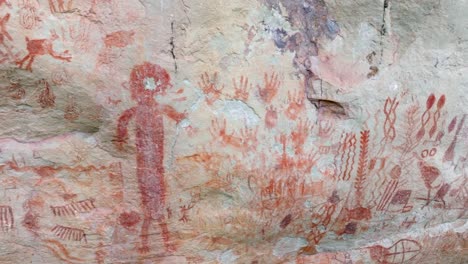 drone close-up shot of ancient indigenous paintings in san jose del guaviare colombia