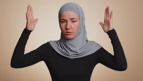 woman showing nonsense gesture with hands and rolling eyes, gossips, empty promises, blah, liars