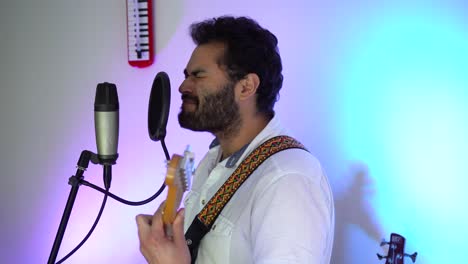 close-up-of-musician-singing-passionately-in-front-of-the-microphone