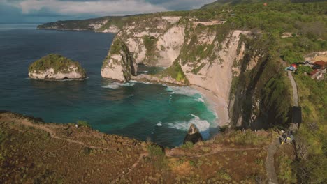 bird eye view of the beautiful diamond beach in nusa penida - indonesia