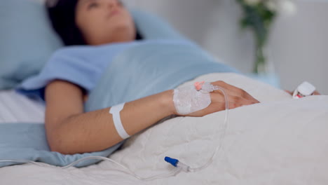 hospital, emergency and hand of woman with iv drip