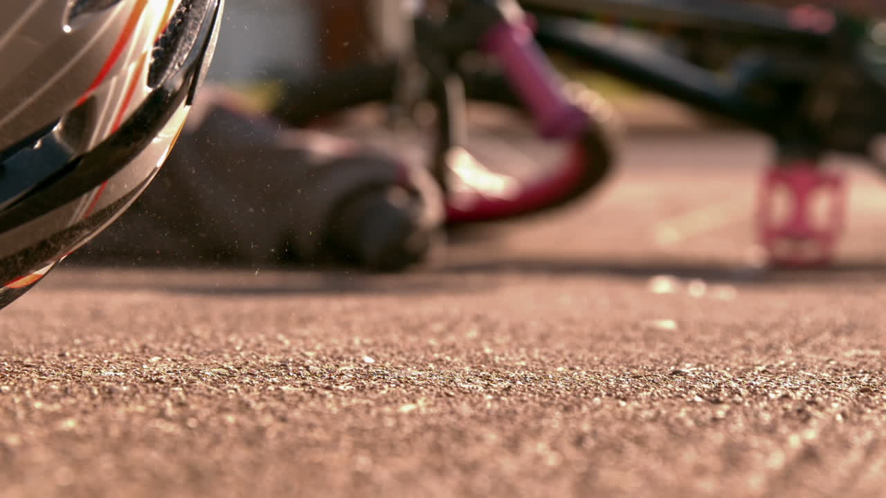Bike helmet falling on the path