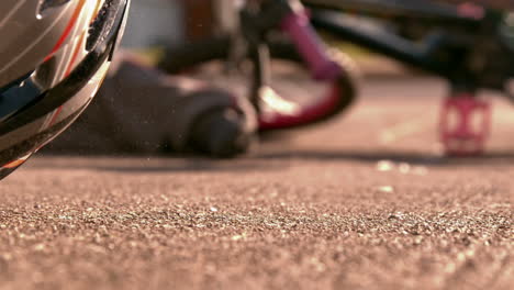 bike helmet falling on the path