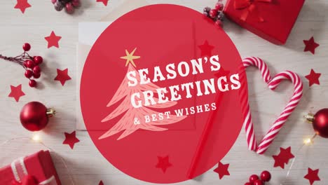 Animation-of-seasons-greetings-text-over-christmas-decorations