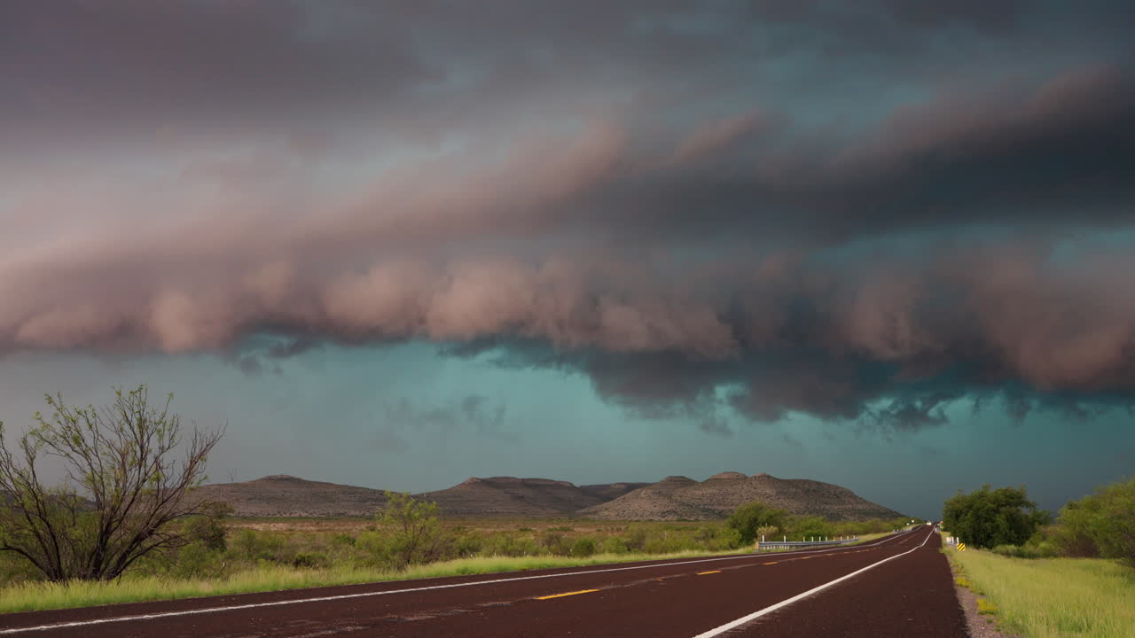Dramatic Time Lapse Showing Storm Development Under Glowing Sunset Sky