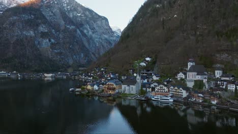 cinematic closing shot of hallstatt austria during sunrise