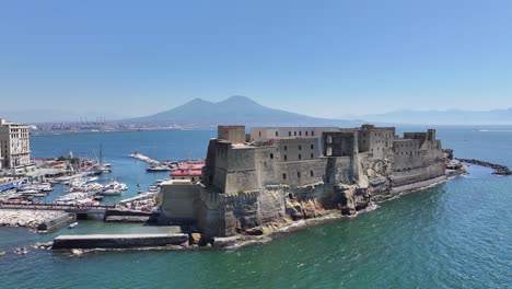 dell ovo castle at naples in campania italy. downtown cityscape. gulf of naples landscape. dell ovo castle at naples in campania italy. medieval castle. skyline medieval building. italy landscape.