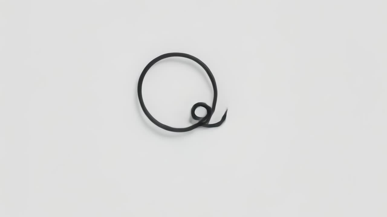 Frame sequence starting with nested loop, thin black band unfolding on white surface, forming heart