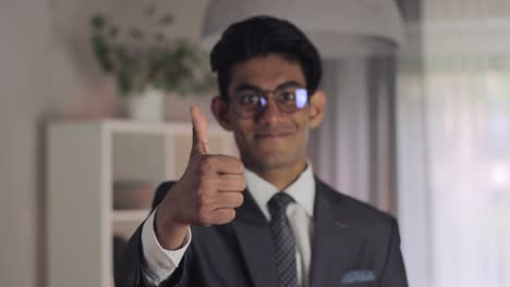 approved by ceo, businessman in suit gives thumbs up, quality work