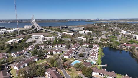 aerial-push-in-to-new-development-around-arthur-ravenel-bridge-in-mount-pleasant-sc,-south-carolina-near-charleston-sc,-south-carolina