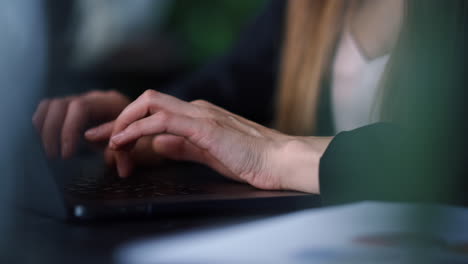 woman using laptop closeup