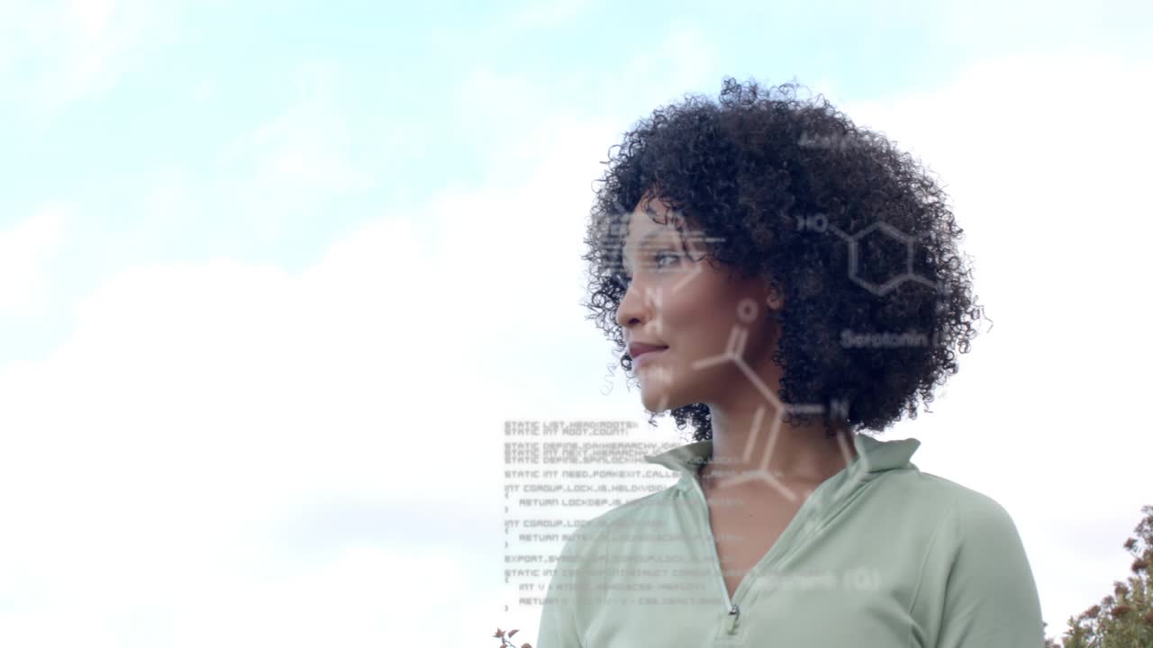 Woman turning, observing offscreen cue in outdoor tech, code and chem diagrams moving across face
