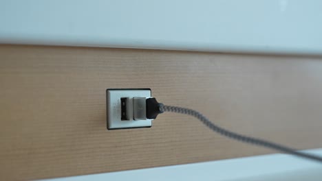 plugging in iphone charger to usb outlet