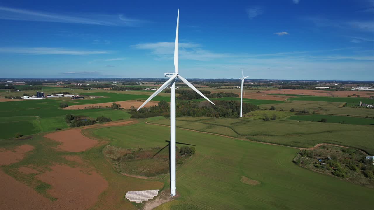 Wind turbines blow in the wind of the Wisconsin countryside