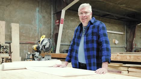 carpenter at work in woodshop