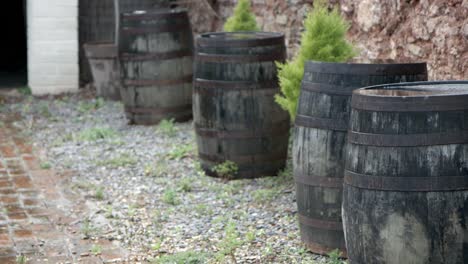 4 barrels on a driveway