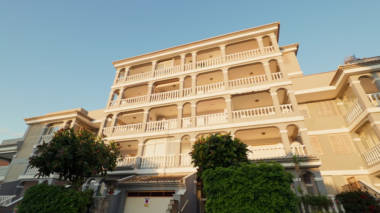 Exterior view of a multi-story building with balconies