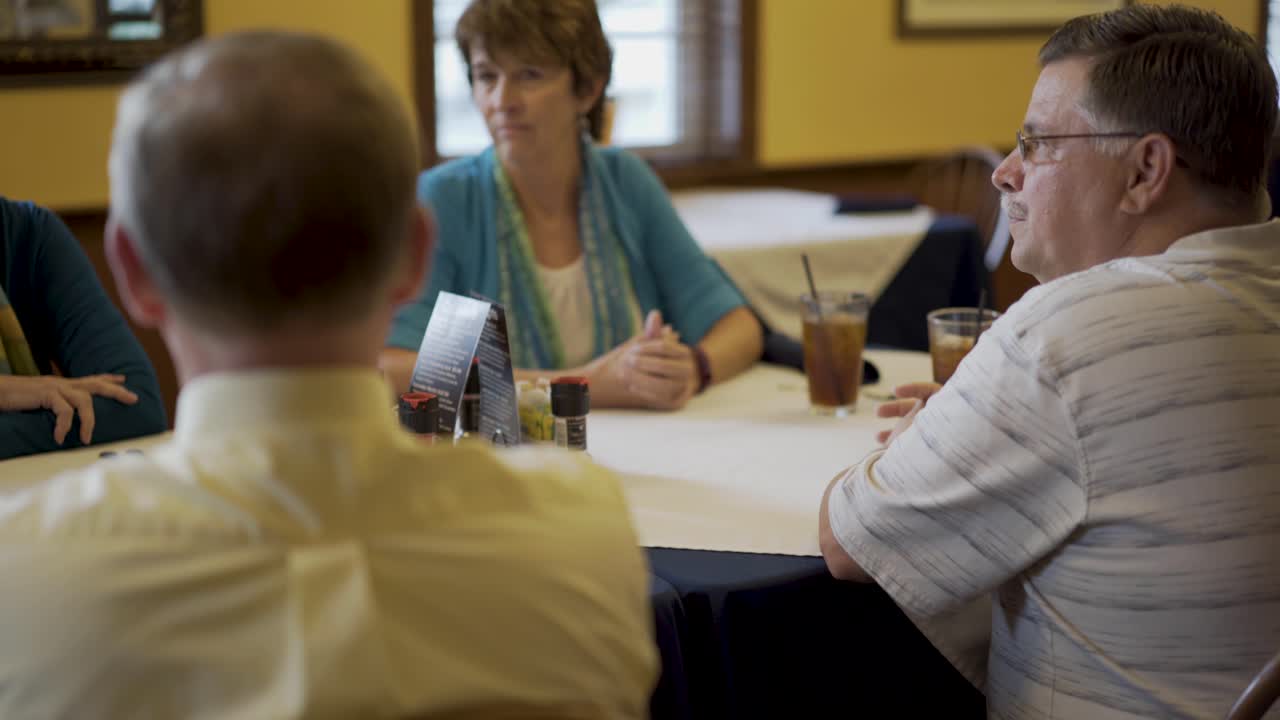 Group of people at a restaurant table