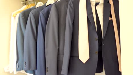 shot of wedding suits, tie, socks, shoes - watches for the groom - groom men