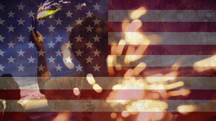 Animation of friends dancing with sparklers on beach against american flag waving
