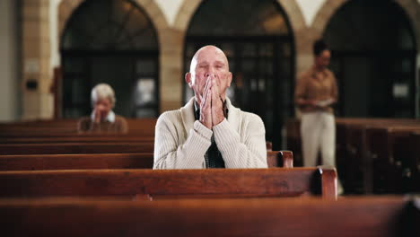 people praying in church