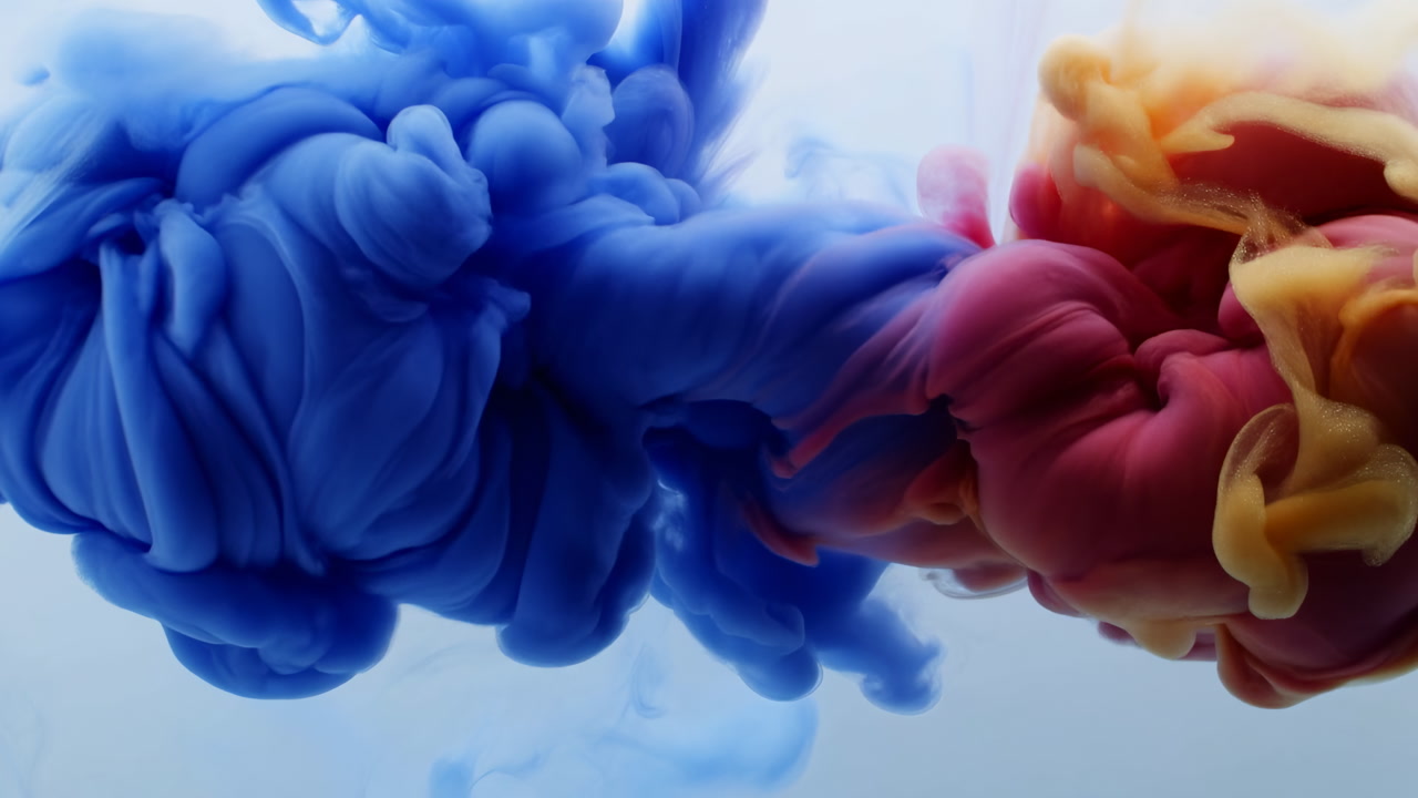Vivid Blue Ink Cloud Billowing And Merging, Rich Blue, Red And Yellow Pigments Diffuse In Liquid With Soft