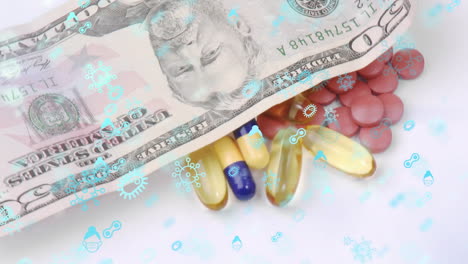 animation of multiple floating covid-19 cell icons over different pills and falling banknotes