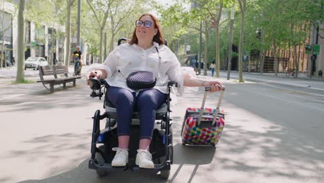Woman traveling in a wheelchair in the city