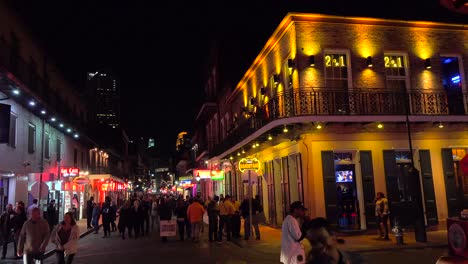 establishing shot of bourbon street in new orleans at night 1