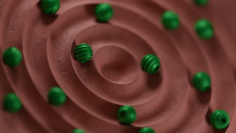 the video features an animation of 3d beads in a circling loop, showcasing their fluid and continuous motion. this hypnotic display emphasizes the beads' seamless movement and the beauty of their synchronized  3d balls beads rolling