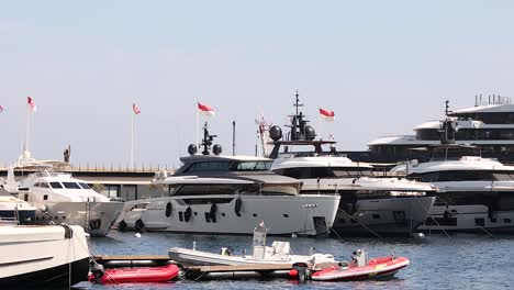 luxury yachts anchored in monte carlo harbor