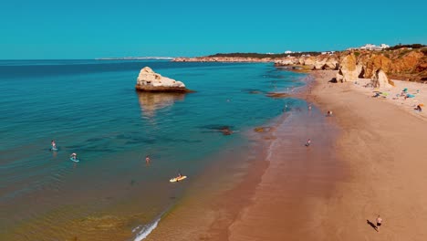 stunning aerial view of a serene beach in portugal with clear water