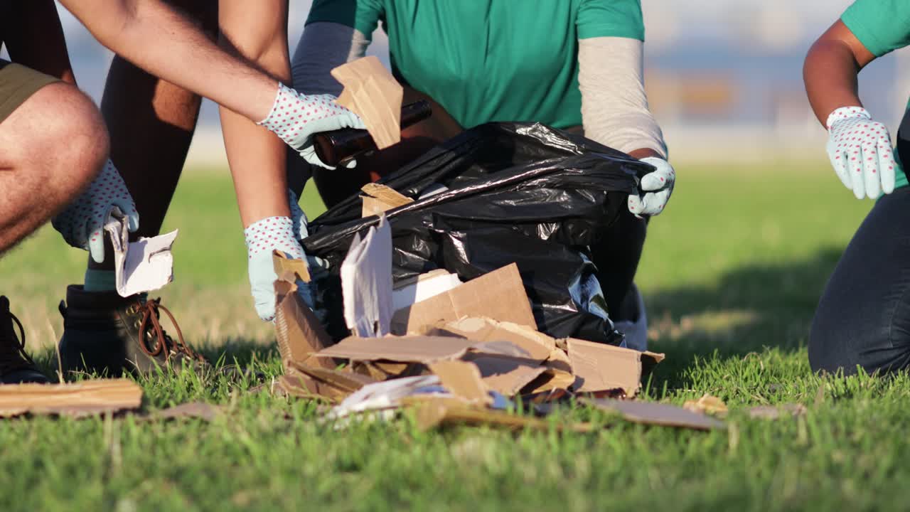 Cropped shot of people sorting rubbish