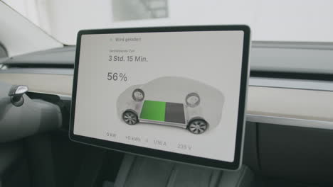 tesla screen: charging process halted in electric vehicle