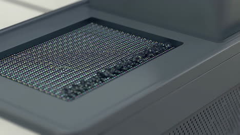 close-up of a machine grid