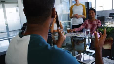 Executives-having-discussion-during-meeting