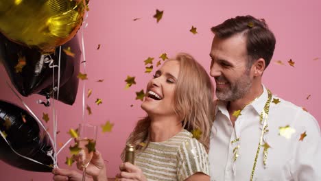 Loved-couple-dancing-with-champagne-and-balloons.