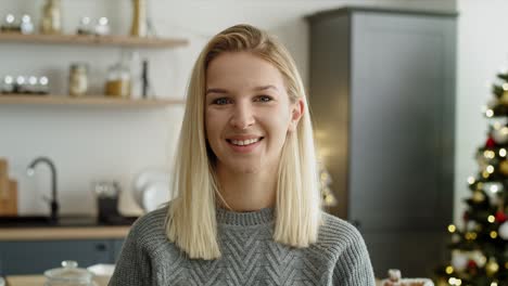 portrait video of woman in the kitchen during christmas